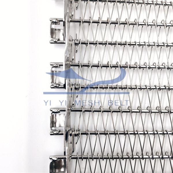 A YIYI technician carefully measuring the width of a self-stacker belt with calipers.