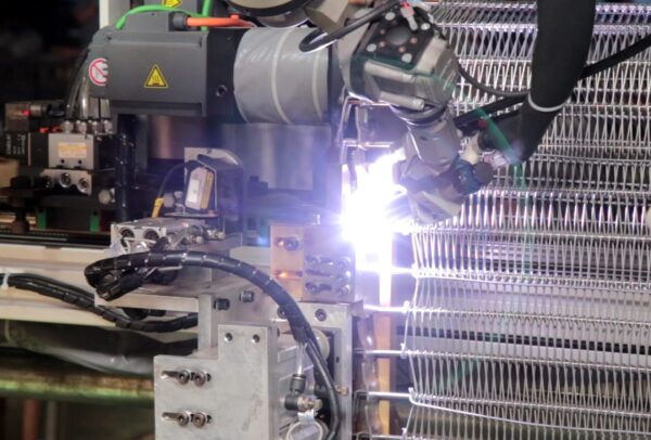 Robotic Welding for Spiral Freezer Belt Production Robotic welding process for consistent spiral freezer belt production