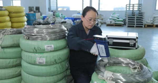 Incoming stainless steel wire checked with a handheld spectral analyser at YIYI Mesh Belt