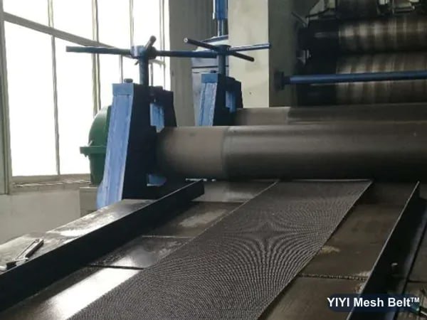 Flattening a Biscuit Belt mesh on the rolling mill
