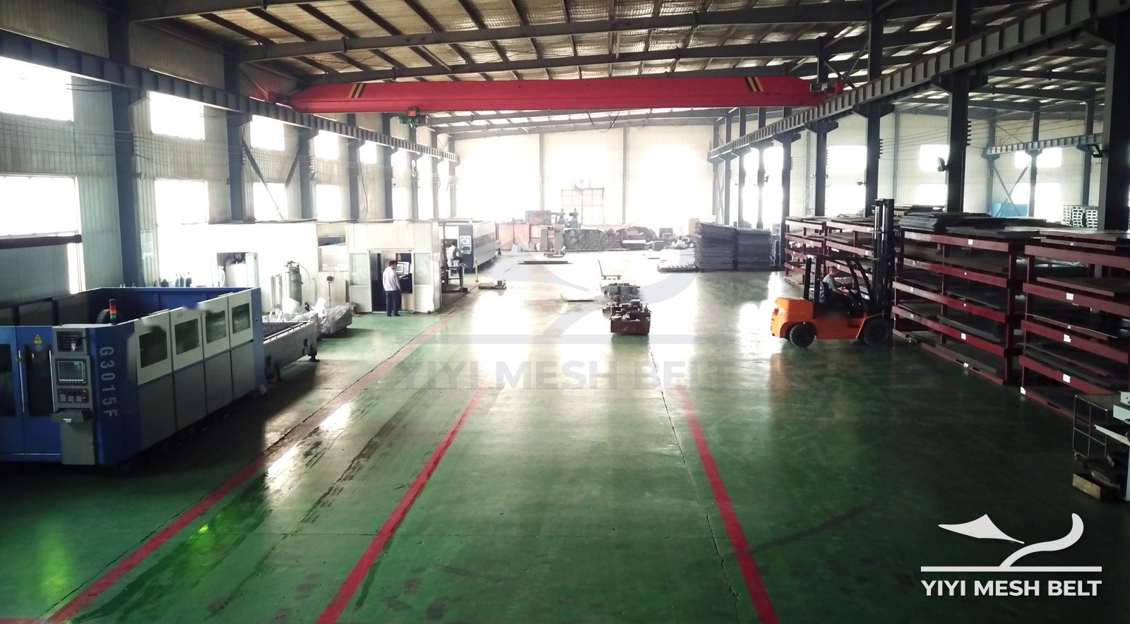 Fabrication workshop with cutting line and plate storage at YIYI Mesh Belt, Ningjin